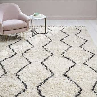 how to clean a wool area rug