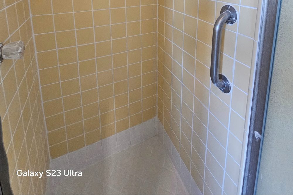 Remove mold from shower grout