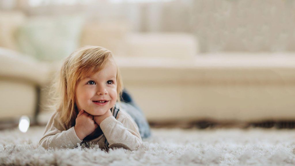 Kid on carpet